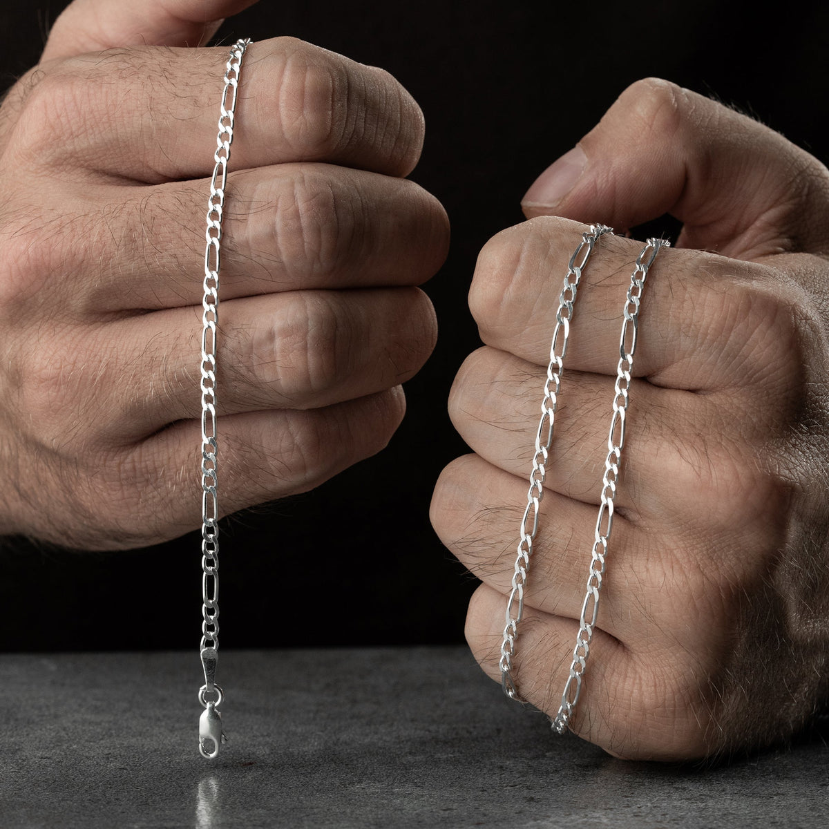 4 mm figaro zincir erkek kolye-bileklik set, elde yakın görünümü.